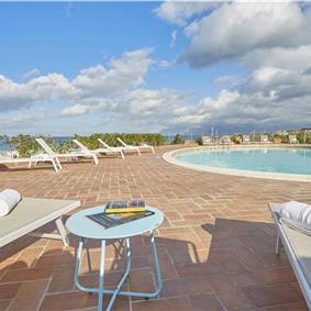 2 bedroom seaside apartments with shared pool, sleeps 4-5